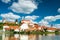 Photo of Beautiful Ptuj Grad in Slovenia with Castle and Fortifications at River Drava.