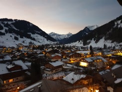 photo of an aerial view of Gstaad in winter. Village and holiday resort in the Swiss Alps.