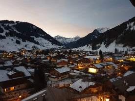 photo of an aerial view of Gstaad in winter. Village and holiday resort in the Swiss Alps.