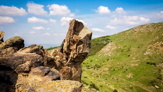 photo of view of "The Sfinx" Natural Monument from Macin Mountains reservation. Tulcea, Romania.