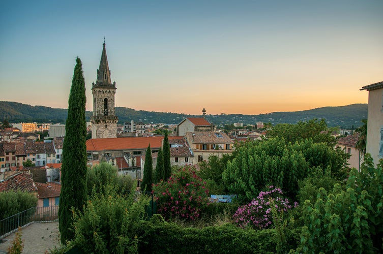 photo of view of View of the graceful town of Draguignan from the hill of the clock tower under the colorful light of the sunset. Located in the Provence region, Var department, southeastern France.