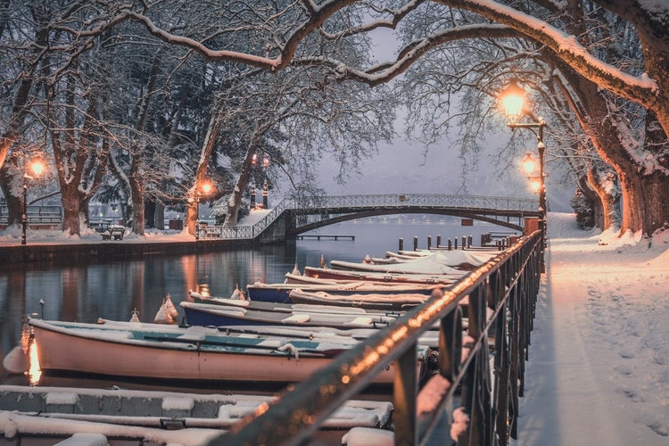 photo of winter on the lake of Annecy at sunset in France.