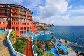 Photo of panoramic aerial view of idyllic coastal village of Porto da Cruz Madeira island, Portugal.