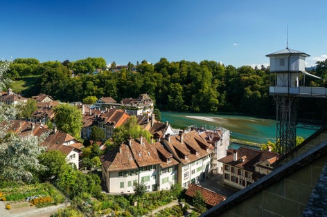 photo of city and Aare River seen from Münster platform Park in Bern, Switzerland.