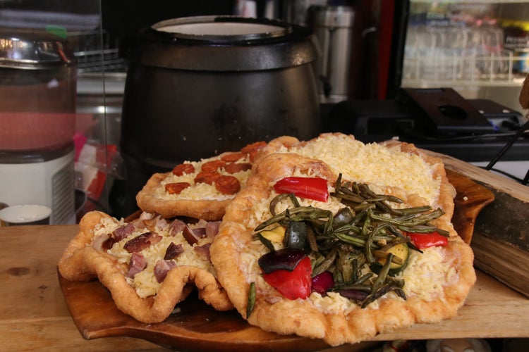 Lángos at a traditional food market in Budapest..jpg