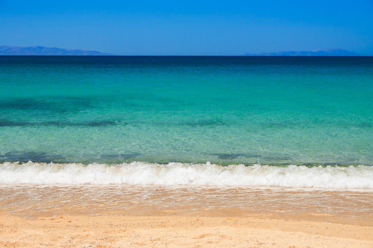 Photo of beautiful Plaka beach in Naxos Island, Cyclades, Greece.