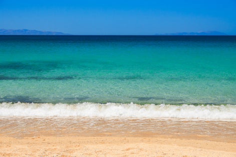 Photo of beautiful Plaka beach in Naxos Island, Cyclades, Greece.