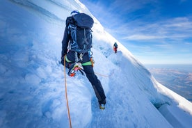 Photo of The winter view on the montains and ski lift station in French Alps near Chamonix Mont-Blanc.