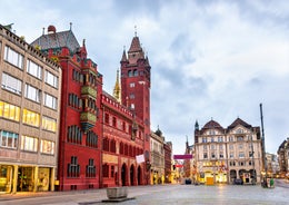 View of the Old Town of Basel with red stone Munster cathedral and the Rhine river, Switzerland.