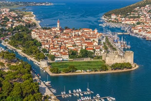 photo of a beautiful panoramic view of Kastel Luksic harbor and landmarks summer view, Split region of Dalmatia, Croatia.