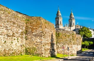Photo of Facade of Santiago de Compostela cathedral in Obradoiro square, Spain.