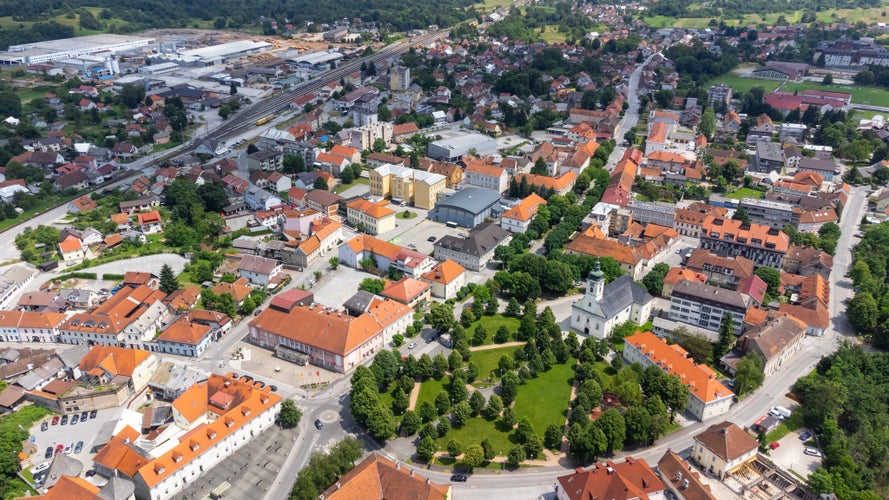 photo of view of Aerial view of Ogulin, a town in north-western Croatia, in Karlovac County, known for its historic stone castle, known as Kula, and the nearby mountain of Klek.