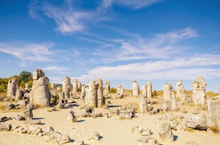 Photo of Saint Anastasia Island in Burgas bay, Black Sea, Bulgaria. Lighthouse tower and old wooden buildings on rocky coast.