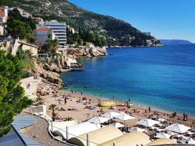 Photo of panoramic aerial view of the old town of Dubrovnik, Croatia seen from Bosanka viewpoint on the shores of the Adriatic Sea in the Mediterranean Sea.