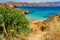 photo of view of The hidden and lonely beach of Agios Sostis, is not equipped with umbrellas and deck chairs, it is protected on windy days, it is a fairly unspoiled place. Mykonos, Cyclades islands, Aegean sea, Greec,Laganas greece.