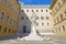 photo of view of Monument to Sallustio Bandini and Palazzo Spannocchi in Piazza Salimbeni. Siena, Italy.