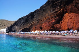 Photo of scenic aerial view of Kamari village and beach at sunrise, Greece.