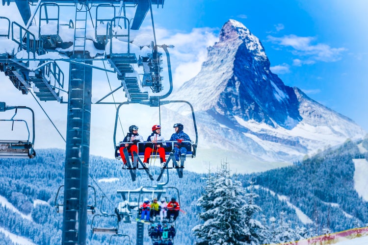 photo of amazing beautiful view of Gornergrat, Zermatt, Matterhorn ski resort in Switzerland with cable chairlift transport.