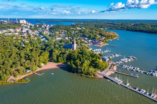 Early autumn morning panorama of the Port of Turku, Finland, with Turku Castle at background.