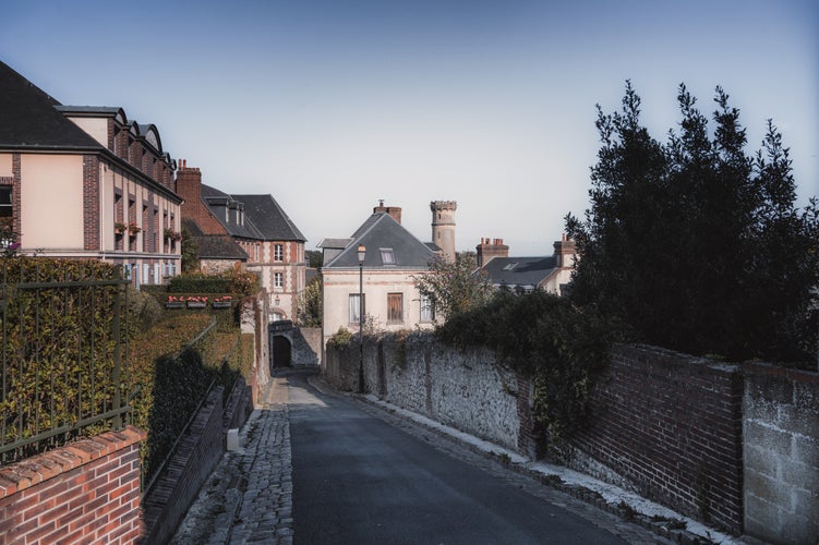 photo of view of Picturesque street view in Honfleur. Honfleur, a charming French town, sits where the Seine River flows into the English Channel, in the northern part of Normandy