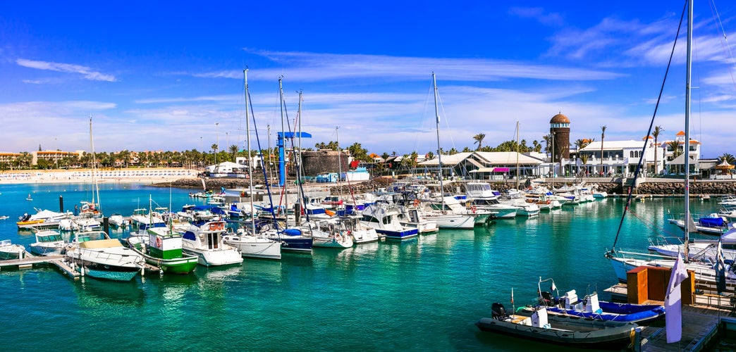 Photo of best of Fuerteventura, Caleta de Fuste beach with marine, popular tourist resort and destination in Canary islands, Spain