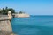 photo of Cadiz Walls of San Carlos and Baluarte de la Candelaria. With the blue sea and sky. Andalusia, Spain.