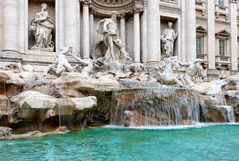 photo of view of Illuminated Fontana Di Trevi, Trevi Fountain at Dusk, Rome, Italy.