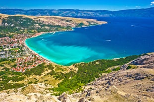 Photo of aerial view of Historic Adriatic town of Krk aerial view, Island of Krk, Kvarner bay of Croatia.