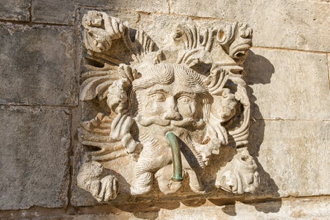 Photo of fragment of Big Onofrio fountain in the Old city of Dubrovnik, Croatia.