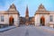 Photo of the main entrance to Christiansborg with the two Rococo pavilions on each side of the Marble Bridge during morning blue hour, Copenhagen, capital of Denmark.