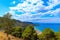 photo of View over the historical city center of Cefalù, the beach and the ocean, seen from Castello di Cefalù, a castle on a high rock, Rocca di Cefalù