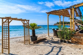 Photo of amazing landscape with wooden pier on Santa Giulia beach, Porto-Vecchio ,France.