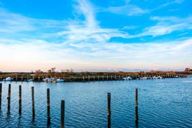 Photo of Pier and sea in town of Grado sunrise view, Italy.