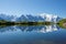 photo of Mont Blanc reflected in Cheserys Lake in winter, Mont Blanc Massif, Alps, France.