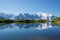 photo of Mont Blanc reflected in Cheserys Lake in winter, Mont Blanc Massif, Alps, France.