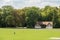 photo of Parc de Champagne with people enjoying the beautiful view in Reims, France.