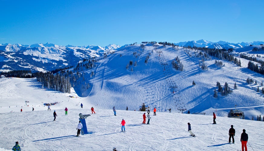 People skiing in Brixen in Winter time.