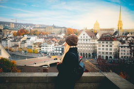 View of the Old Town of Basel with red stone Munster cathedral and the Rhine river, Switzerland.