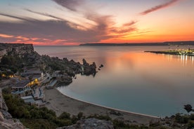 Photo of attractive view of Golden bay in village Manikata on a sunny day, north-west coast of Malta island.