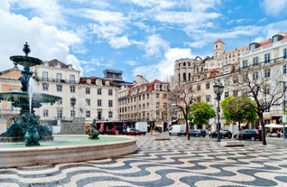 Photo of Lisbon City Skyline with Sao Jorge Castle and the Tagus River, Portugal.