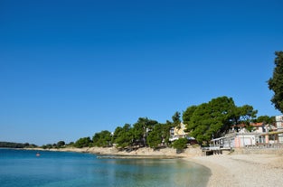 Photo of aerial view of beautiful town of Medulin waterfront view, Istria region of Croatia.