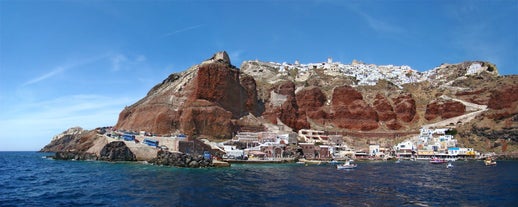 Photo of beautiful White architecture of Oia village on Santorini island, Greece.