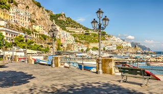 Photo of aerial morning view of Amalfi cityscape on coast line of Mediterranean sea, Italy.