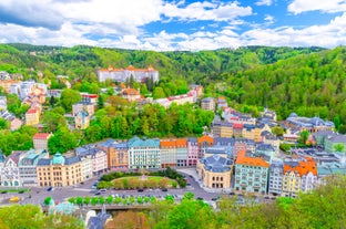 Photo of scenic summer view of the German traditional medieval half-timbered Old Town architecture and bridge over Pegnitz river in Nuremberg, Germany.