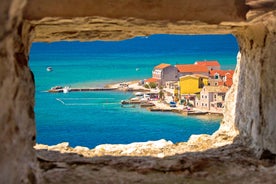 Photo of aerial view of Brodarica village near Sibenik beach and coastline, Dalmatia region of Croatia.