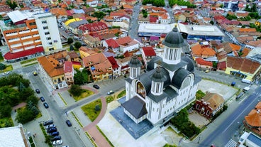 Photo of the facade of the Administrative Palace of Craiova (today Dolj Prefecture and County Council), an imposing historical monument located on the territory of Craiova, Romania.