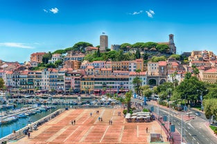 Photo of aerial cityscape view on French riviera with yachts in Cannes city, France.