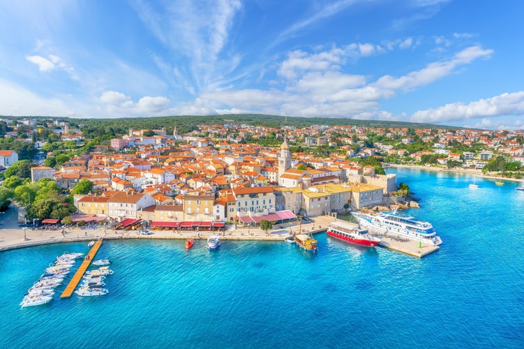 Photo of aerial view with Krk town in Krk island, Croatia.