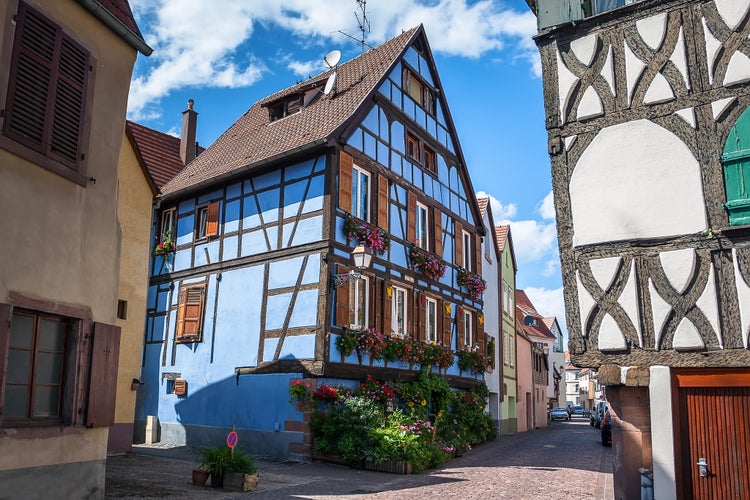 photo of view of Beautiful half-timbered houses with red tiled roofs in the historic center of Selestat in Alsace. France