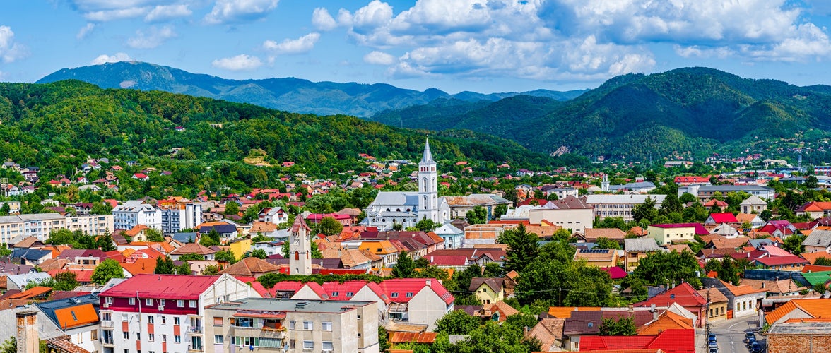 photo of view of Aerial view of Baia Mare city with roof tops and the Catholic Cathedral in Baia Mare, Maramures, Romania; Assumption of Mary Cathedral or Saint Mary, the greek-catholic cathedral in Baia Mare